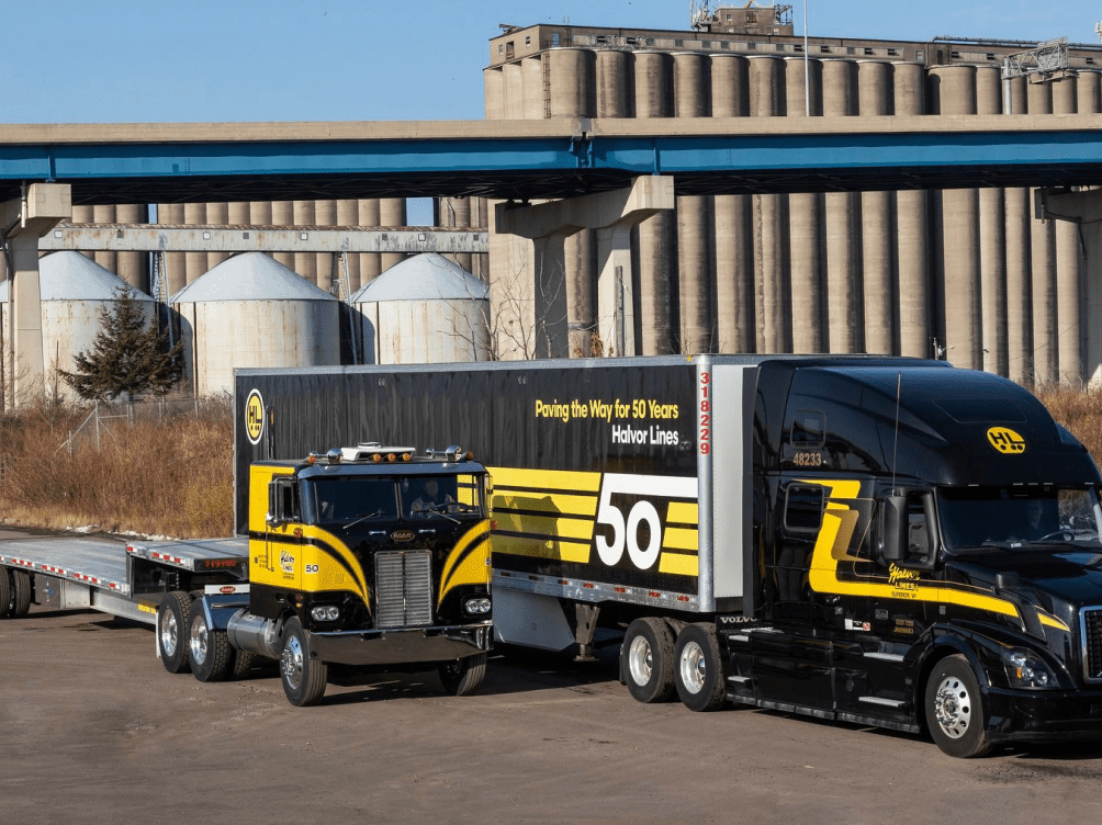 Two trucks at warehouse